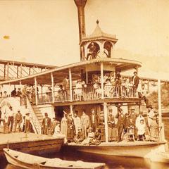 Bow view of the Alexander Mitchell at landing with passengers posing on both decks