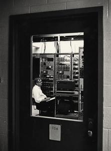 Man monitoring machines at Biotron