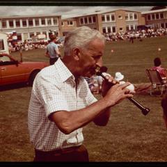 Testing a young piper's chanter, 1984 Blairgowrie Highland Games