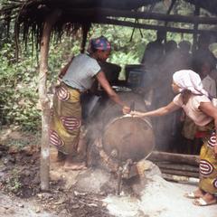 People at stove making ogogoro