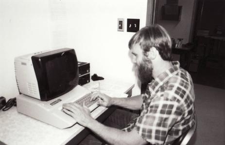 Tim Meinke on a computer