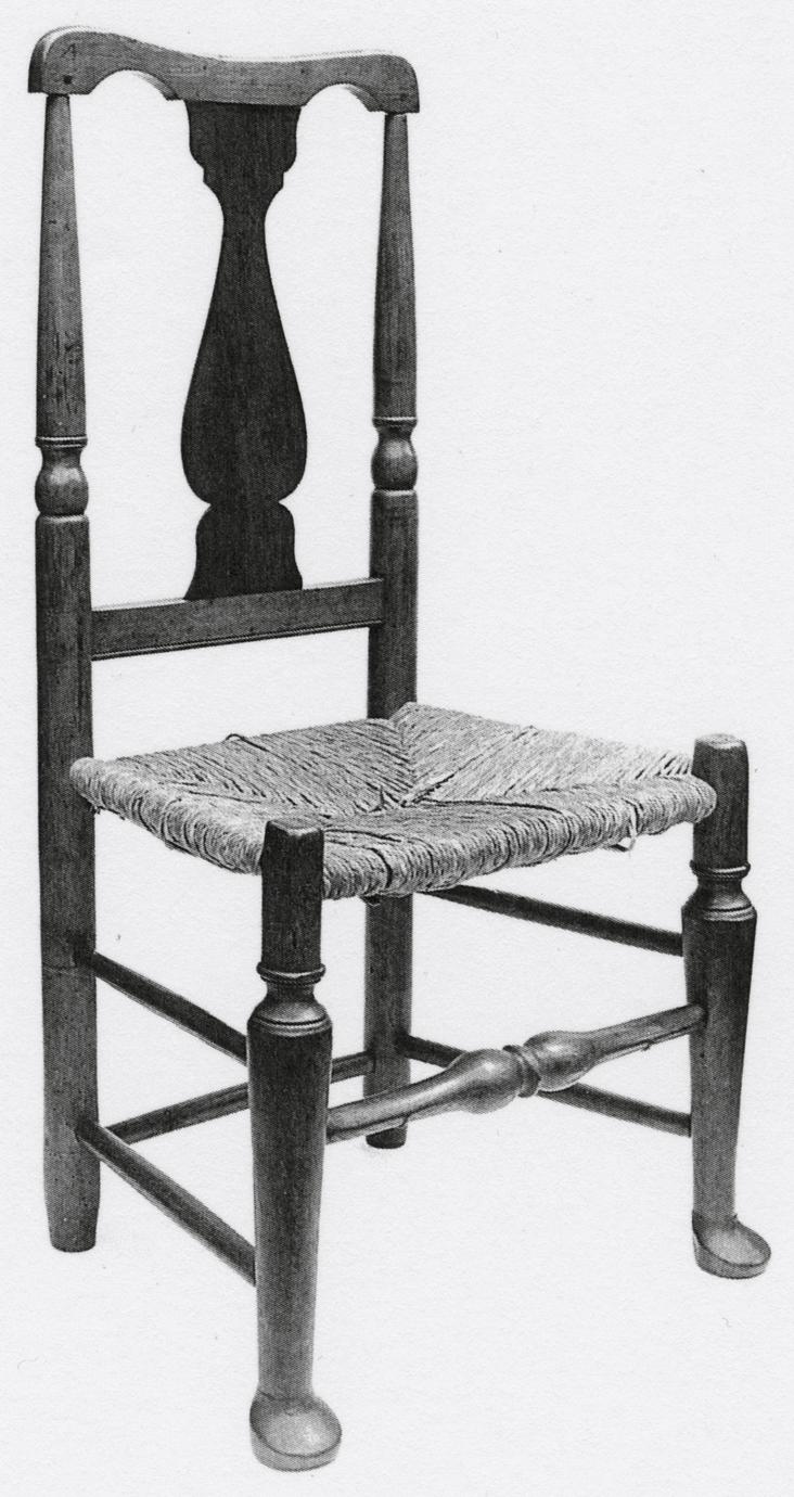 Black and white photograph of a "splat-back" side chair.