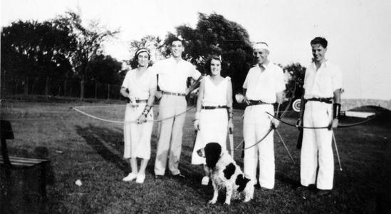 Archery practice with group (Estella, Starker, Ginny Emlen, AL, John Emlen), ca. 1940