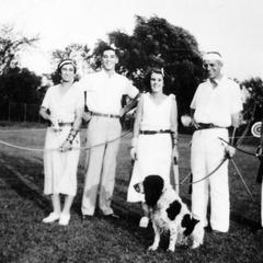 Archery practice with group (Estella, Starker, Ginny Emlen, AL, John Emlen), ca. 1940