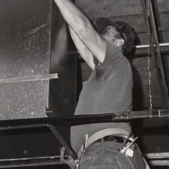 Construction worker working on the Wells Culture Center, Janesville, 1982