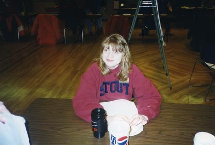 Stout Student Association, Heather Schnorr sitting at table eating