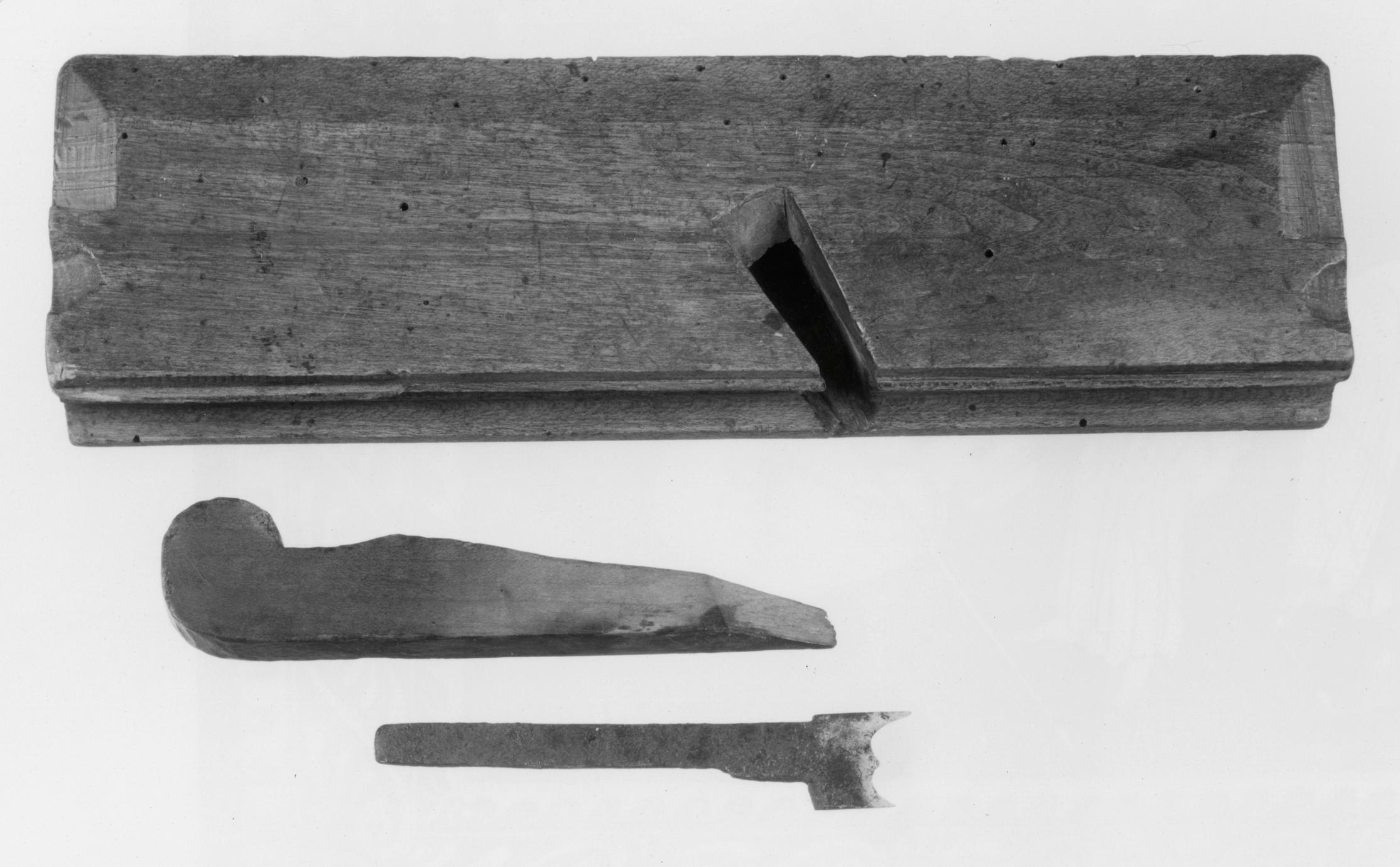 Black and white photo of a double bead plane.