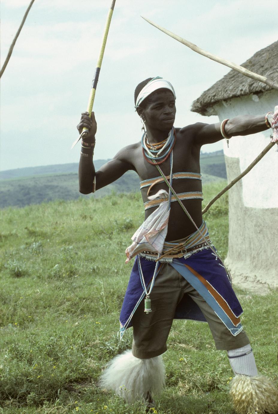AFRIPICS - Two traditional Xhosa men stick fighting out in the open