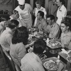 Group of professionals gather for a meal