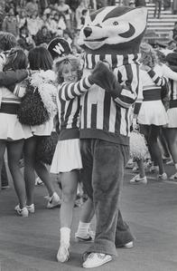 UW cheerleader dances with Bucky Badger