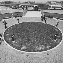 Students entering the campus via the circle entrance of the Library Learning Center