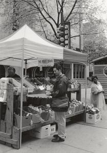 Student at State Street fruit stand