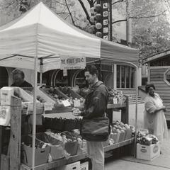 Student at State Street fruit stand