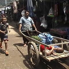 Man carting two kids