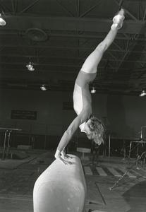Female gymnast on vault