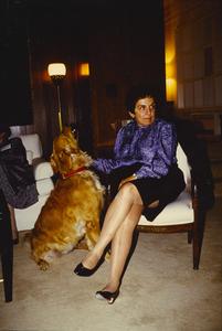 Chancellor Donna Shalala petting her dog