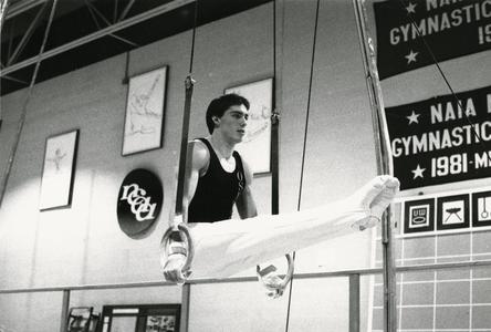 Male gymnast on rings