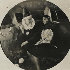 Two clowns in a car