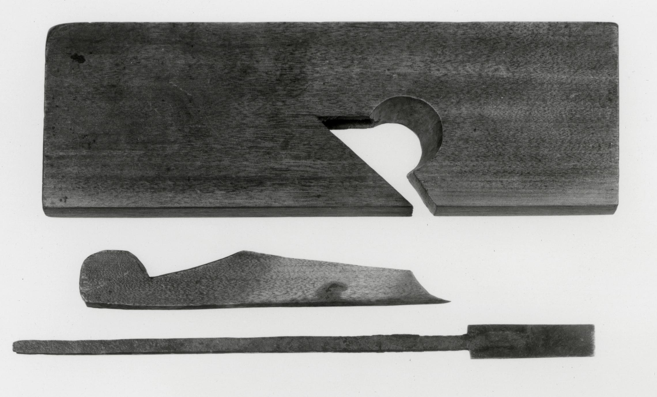 Black and white photograph of a square-mounted rabbet plane.