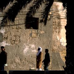Passers-by Viewed Through Marcus Aurelius Arch in Tripoli Medina