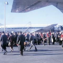 Boarding the plane to Pasadena, 1963 Rose Bowl
