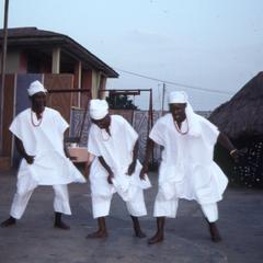 Three dancers in white