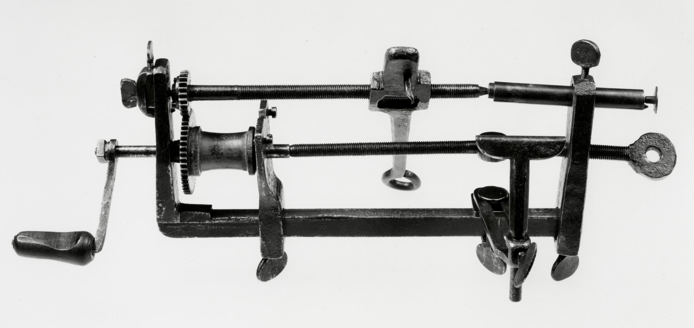 Black and white photo of a clock-barrel and screw-threads cutter (fusee engine).