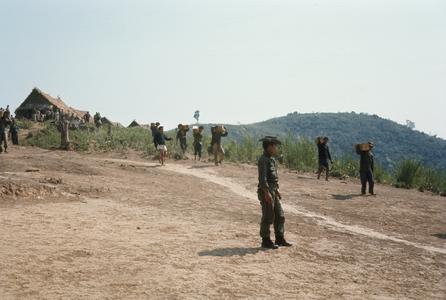 Men carrying ammunition