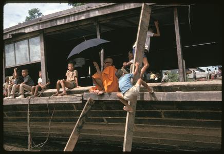 Boat races : monk on barge