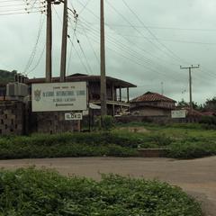 Road signs and Iloko houses