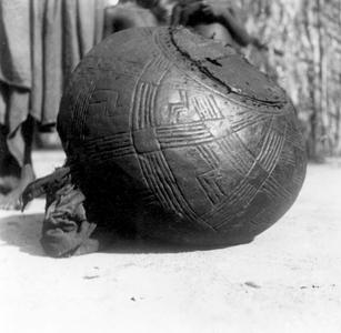 A Round Friction Drum Called "Leopard in the Village"