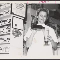 A pharmacist prepares a prescription