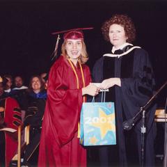 Sandi Brunette-Hill and student at commencement