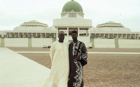 Harrison and driver in front of National Assembly