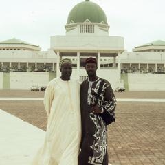 Harrison and driver in front of National Assembly