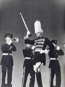 Drum major with trumpeters
