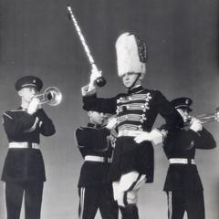 Drum major with trumpeters
