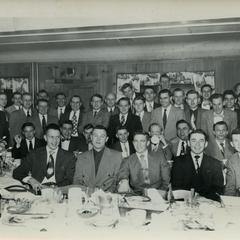 Sigma Tau Gamma group photograph at dinner