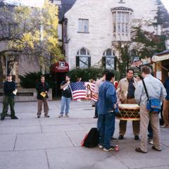 Playing a drum at Columbus Day protest