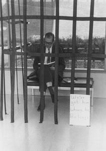 Chancellor Edward W. Weidner in a "jail" made of crepe paper