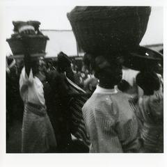 Women carrying baskets on their head