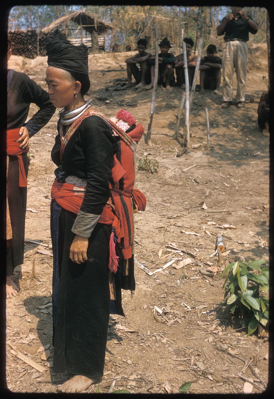 Hmong (Meo) spectator with baby