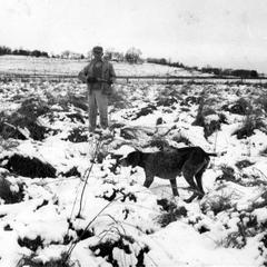 Hunting with his dog, Gus, near the Shack, November 1943 (in snow)