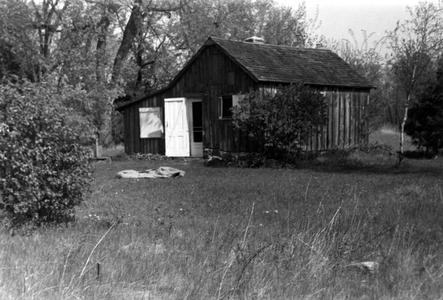 Shack with sleeping bag in front