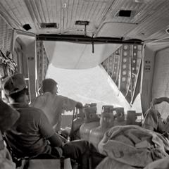 Passengers and freight on an Air America Caribou flight