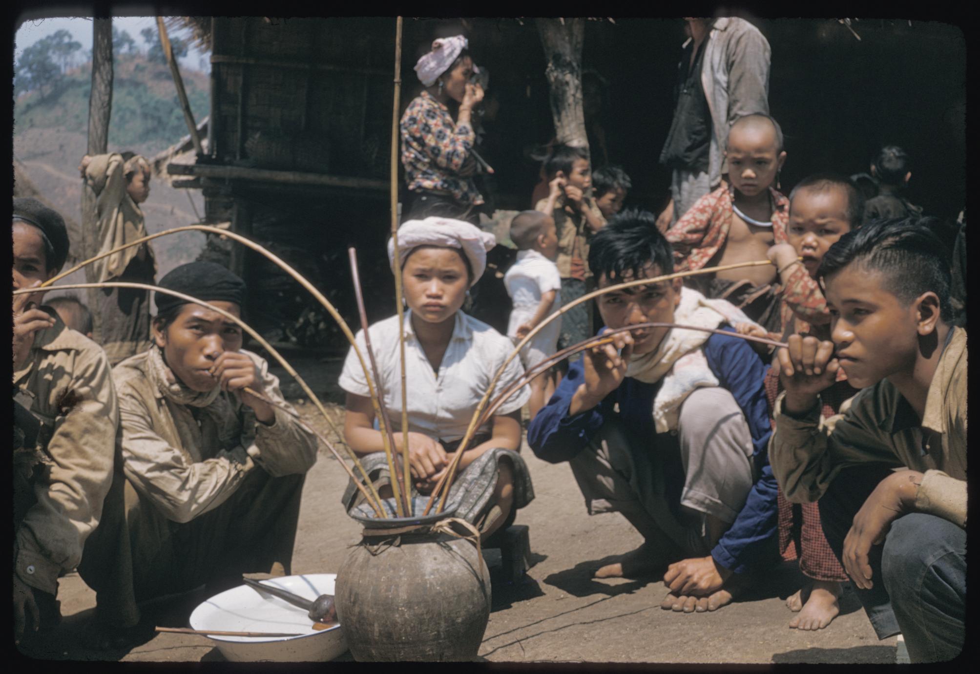 ‎Kammu (Khmu') drinking rice wine UWDC UWMadison Libraries