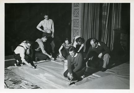 Manual Arts Players members painting a stage setting