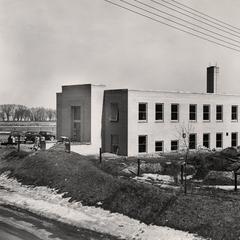 Exterior view of Malt and Barley Lab with cars