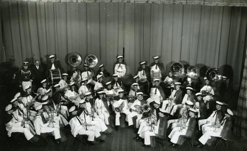 Stout Band group photograph on stage, Director : Harold Cooke