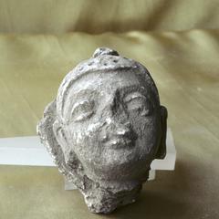 Object 1 titled Stucco head of Buddha